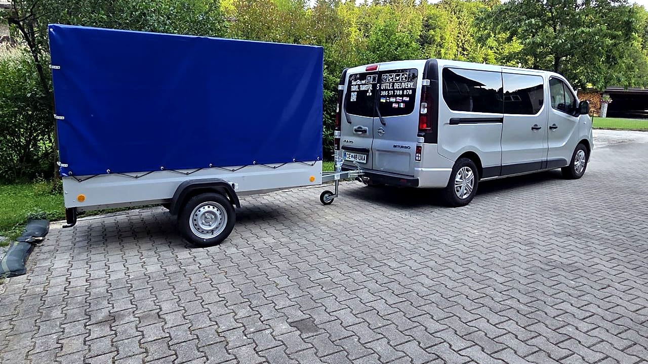 TourSlo Opel Vivaro with a covered trailer