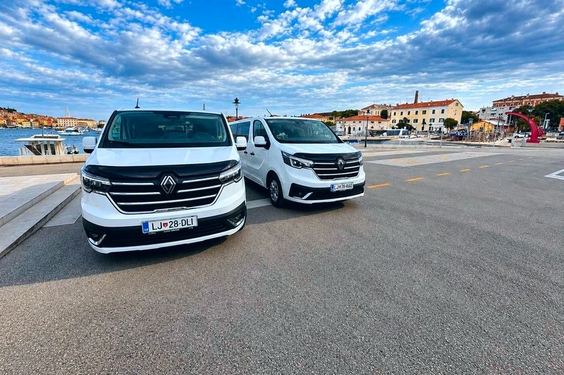 Two new white Renault Trafic vans of TourSlo on the Rovinj seafront